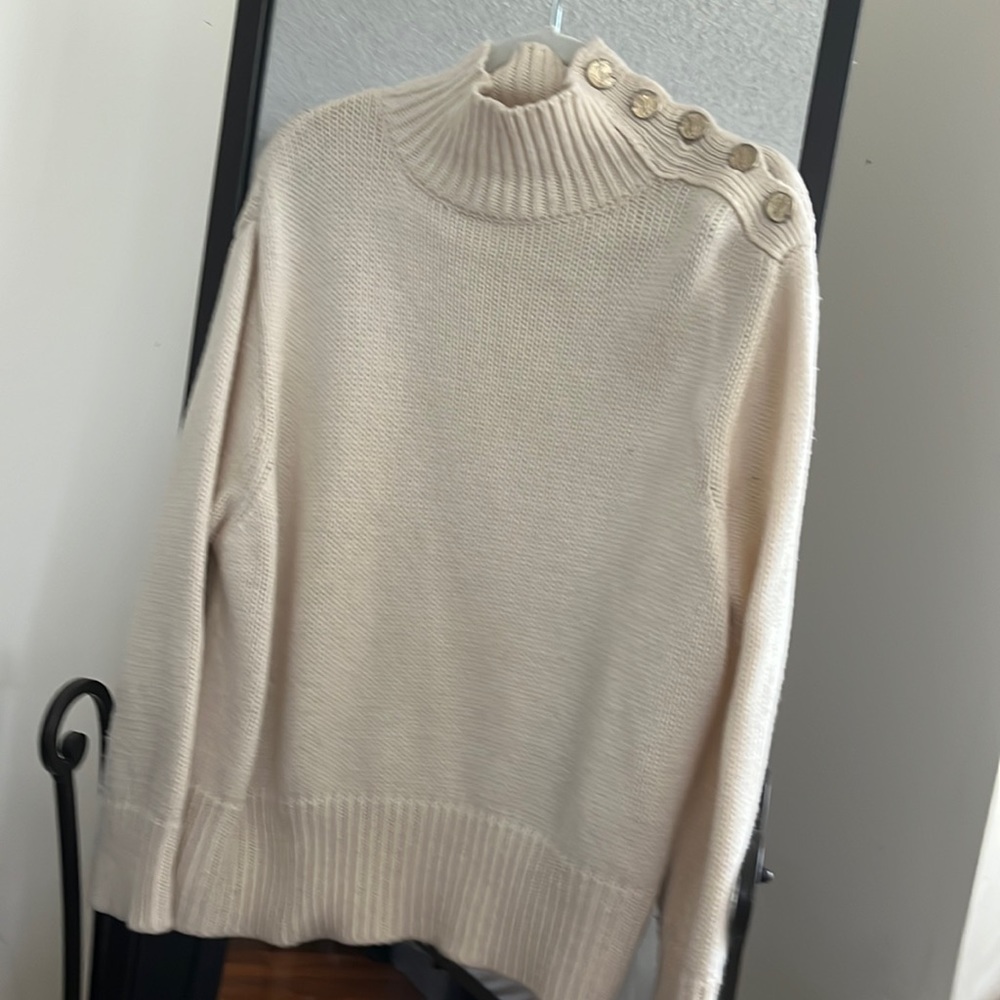 Knit sweater with gold buttons